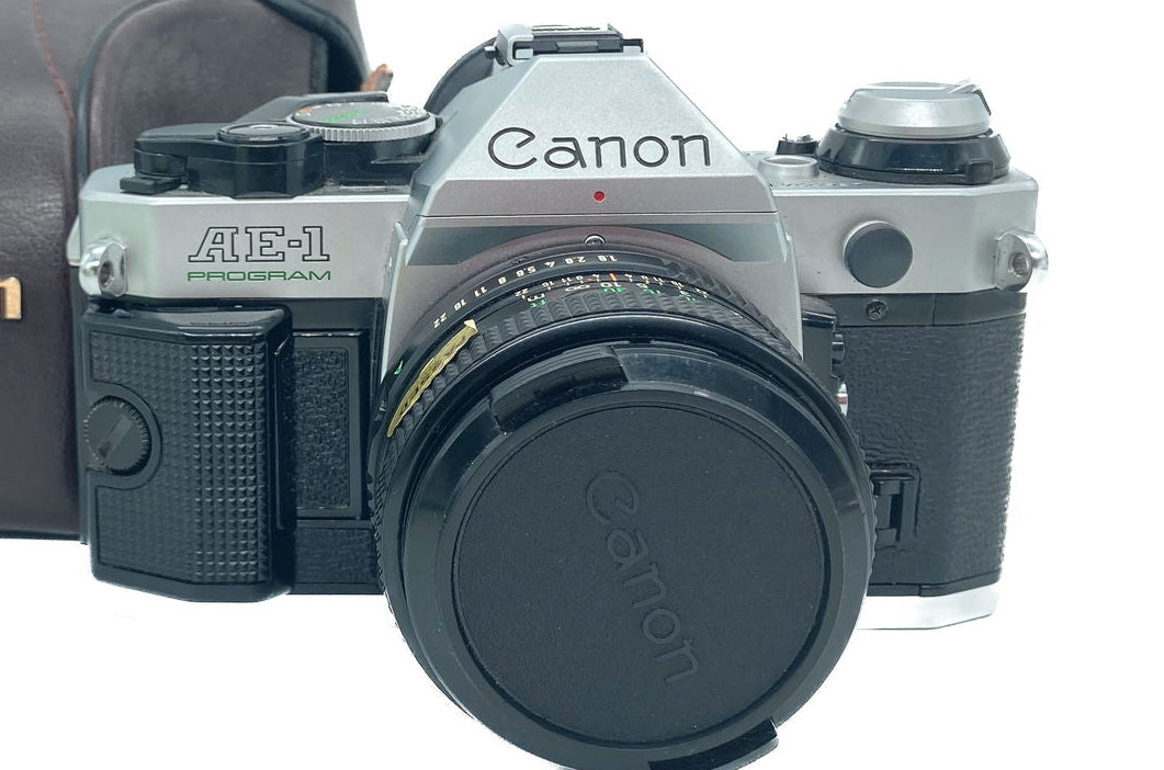 CANON AE1 program + 50mm f1.8 pari al nuovo!! - Fratticioli Store