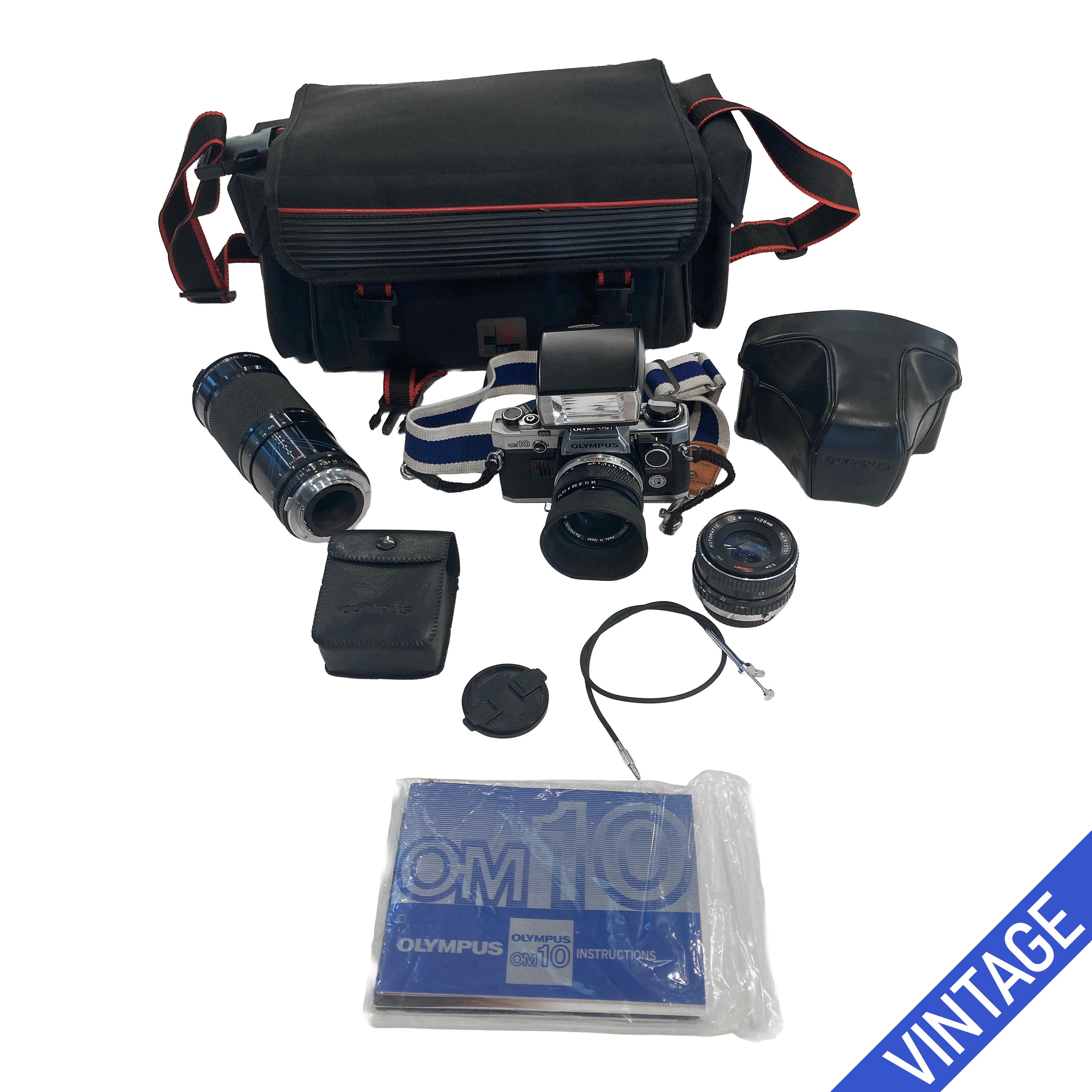 Olympus OM10 + Kit con 3 Obiettivi + Flash + Borsa