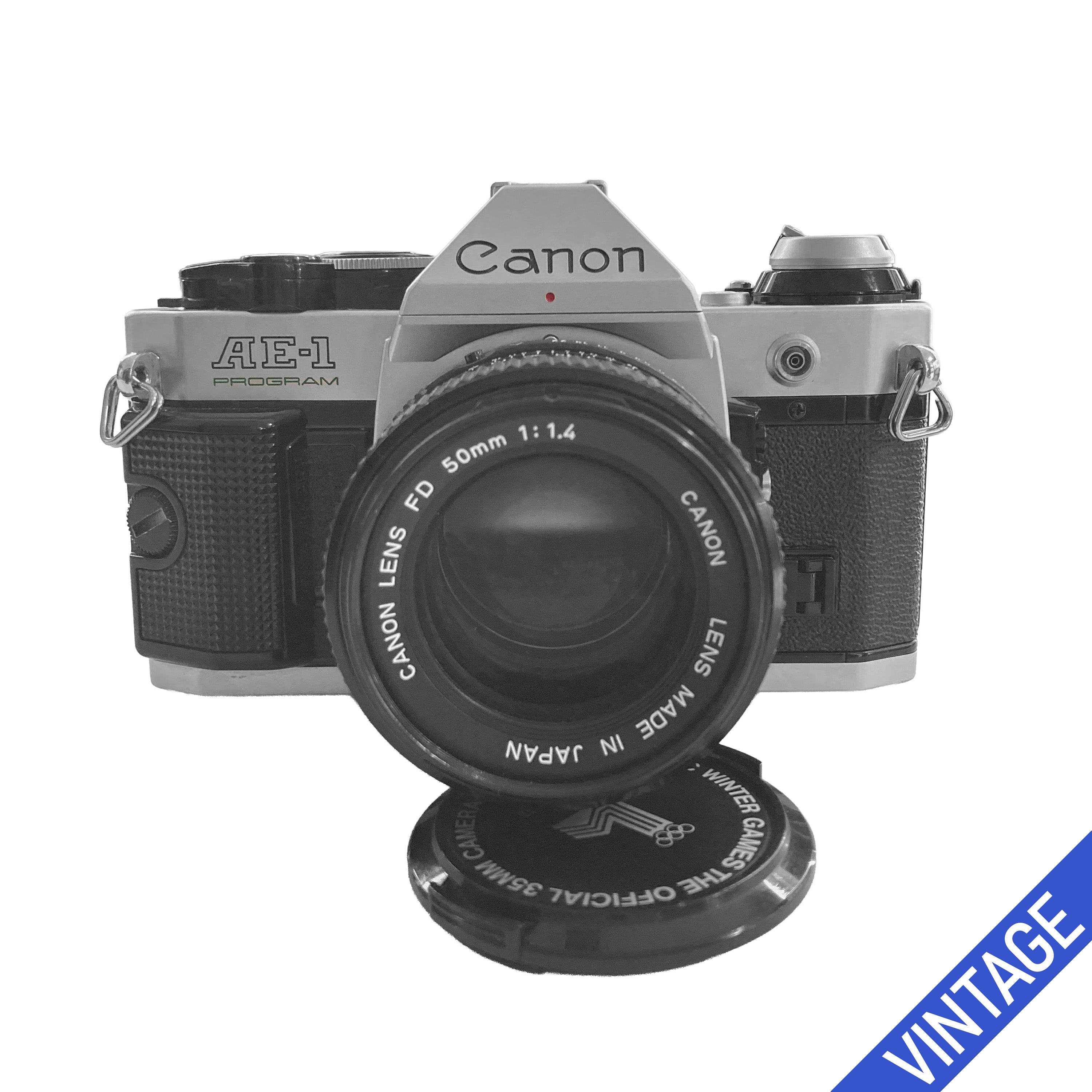 Canon AE-1 Program + 50 mm f/1.4  Come Nuova